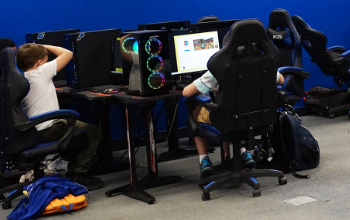 West Mifflin students sit at computers in the Titan E-Sports room. E-sports is one of many extracurricular opportunities offered to students.